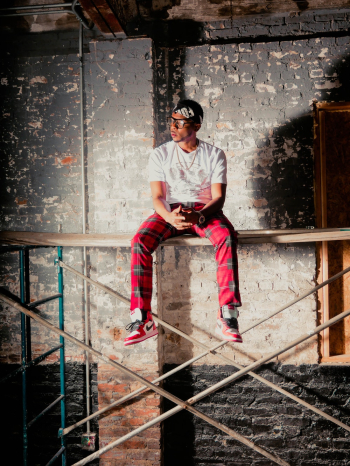Man Sitting On Scaffolding Man Sitting On Scaffolding