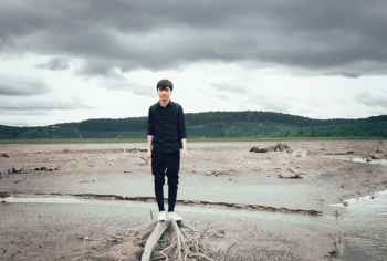 Man Standing Near Body of Water Man Standing Near Body of Water