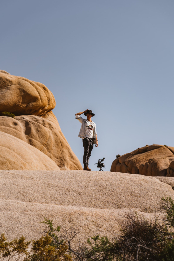 Man Standing Near Rocks Man Standing Near Rocks
