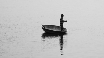 Man Standing on Boat Man Standing on Boat