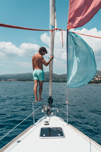 Man Standing on Boat Man Standing on Boat