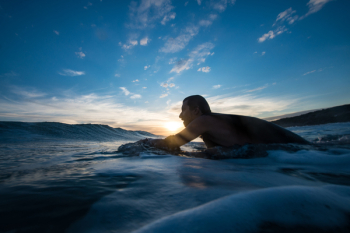 Man Surfing during Blue Hour Man Surfing during Blue Hour