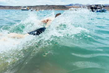 man swimming on sea man swimming on sea