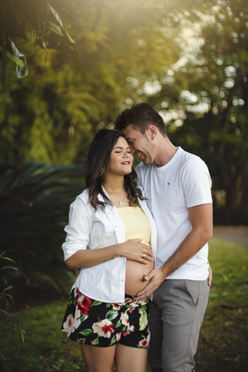 Man Touching Belly of Pregnant Woman Man Touching Belly of Pregnant Woman