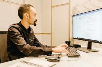 Man Typing on Computer Keyboard Man Typing on Computer Keyboard