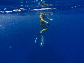 Man Underwater Photo Man Underwater Photo