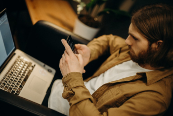 Man Using His Smartphone Man Using His Smartphone