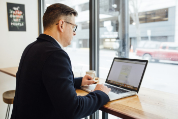 Man Using Macbook