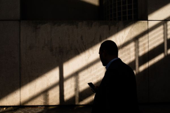 man using smartphone man using smartphone