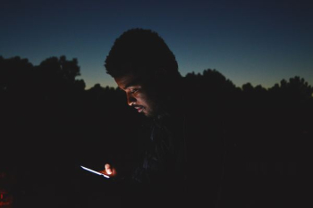 man using smartphone man using smartphone