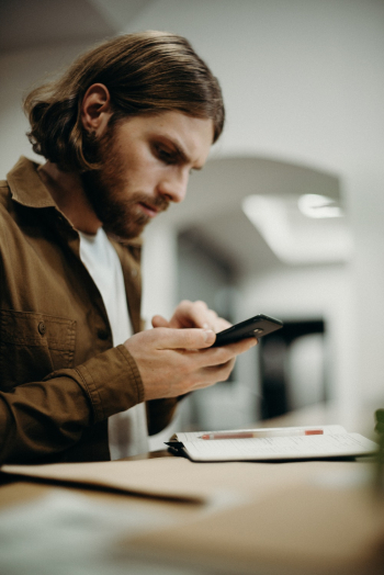 Man Using Smartphone Man Using Smartphone