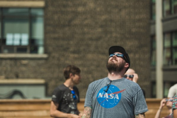 Man Watches Eclipse Man Watches Eclipse