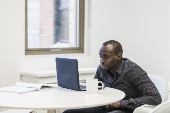 Man Watches Laptop Man Watches Laptop