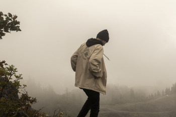 Man Wearing A White Hooded Jacket Man Wearing A White Hooded Jacket