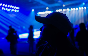 Man Wearing Black Baseball Cap Standing Inside Ring Man Wearing Black Baseball Cap Standing Inside Ring