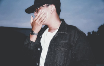 Man Wearing Black Button-up Denim Dress Shirt