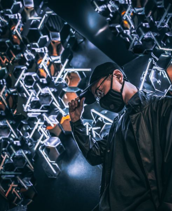 man wearing black cap, face mask and black leather jacket man wearing black cap, face mask and black leather jacket