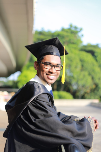 Man Wearing Black Graduation Gown and Cap Man Wearing Black Graduation Gown and Cap