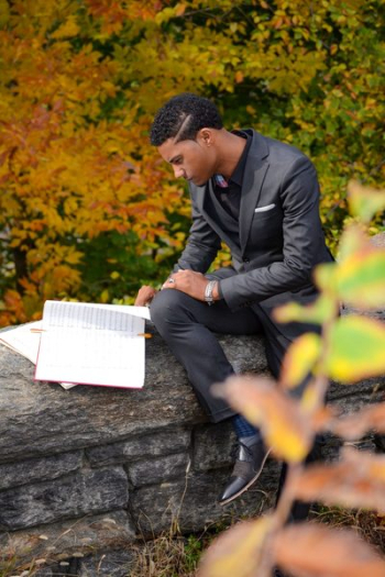 Man Wearing Black Suit Reading Book Man Wearing Black Suit Reading Book