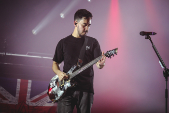 Man Wearing Black T-shirt And Playing Electric Guitar Man Wearing Black T-shirt And Playing Electric Guitar