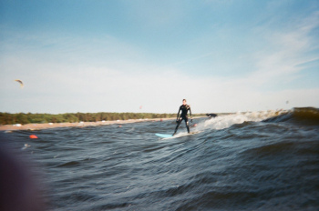 Man Wearing Black Wet Suit Surfing Man Wearing Black Wet Suit Surfing