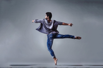 Man Wearing Blue Jeans Doing Pirouette Spin Man Wearing Blue Jeans Doing Pirouette Spin