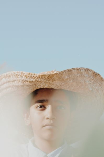 man wearing brown hat man wearing brown hat