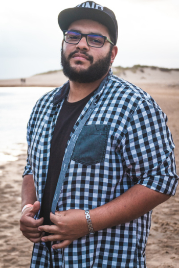 Man Wearing Gingham Shirt And Black Framed Eyeglasses