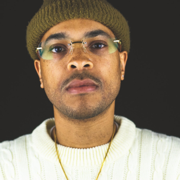 Man Wearing Gold-colored Necklace and Brown Knit Cap Man Wearing Gold-colored Necklace and Brown Knit Cap