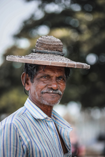 Man Wearing Straw Hat Man Wearing Straw Hat