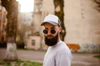Man Wearing White Baseball Hat Man Wearing White Baseball Hat