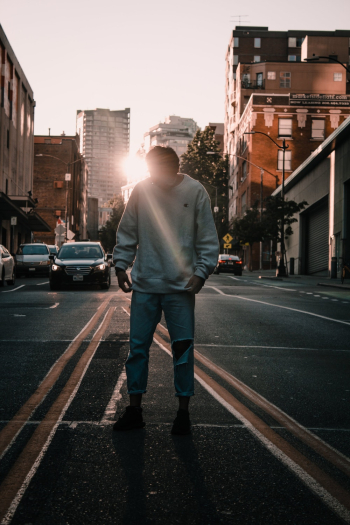 Man Wearing White Sweater and Gray Denim Jeans Man Wearing White Sweater and Gray Denim Jeans