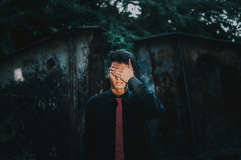 Man Wears Black Suit With Red Necktie Man Wears Black Suit With Red Necktie