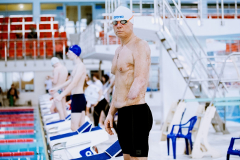 Man With Disability Wearing A Black Swimming Trunks Man With Disability Wearing A Black Swimming Trunks