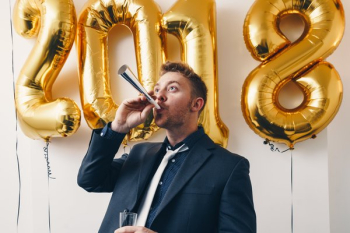 Man With New Years Noise Maker Man With New Years Noise Maker
