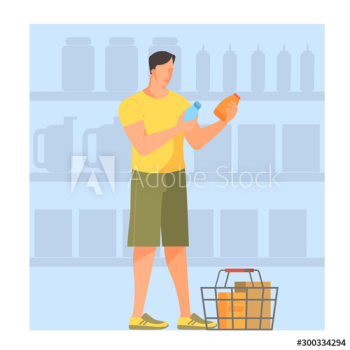 Man with shopping basket choosing groceries in supermarket
