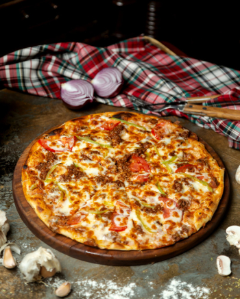 Meat pizza with bell peppers tomato and cheese Free Photo Meat pizza with bell peppers tomato and cheese Free Photo