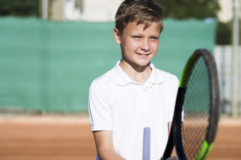 Medium shot kid playing tennis Free Photo Medium shot kid playing tennis Free Photo