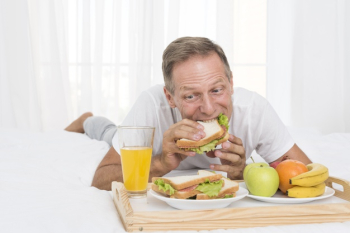 Medium shot man having breakfast in bed Free Photo Medium shot man having breakfast in bed Free Photo