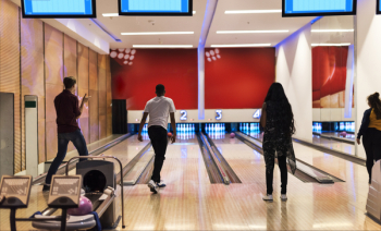 Men and Women Playing Bowling Men and Women Playing Bowling