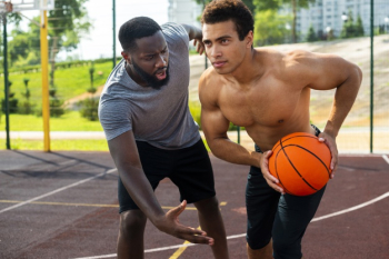 Men playing basketball long shot Free Photo Men playing basketball long shot Free Photo