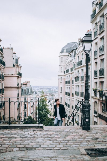 Men's Fashion Climbing Steps To Cobbled Street