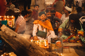 Men Sitting During A Celebration Men Sitting During A Celebration