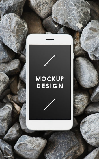 Mobile phone on a rocky surface | Free stock psd mockup - 527589