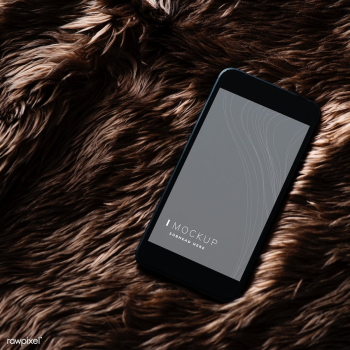 Mobile phone screen mockup on fur surface | Free stock psd mockup - 527494