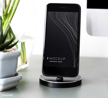 Mockup of a mobile phone on a stand | Free stock psd mockup - 527570