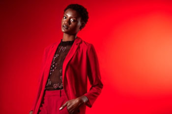 Model In Red Suit With Sheer Top Model In Red Suit With Sheer Top