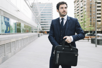 Modern businessman in urban environment Free Photo
