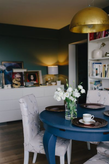 Modern dining room with blue table Modern dining room with blue table