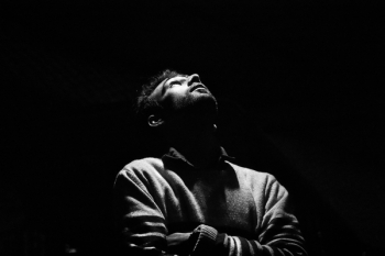 Monochrome Photo of Man Looking Up Monochrome Photo of Man Looking Up